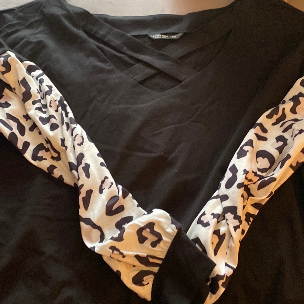 Long sleeve black and leaped